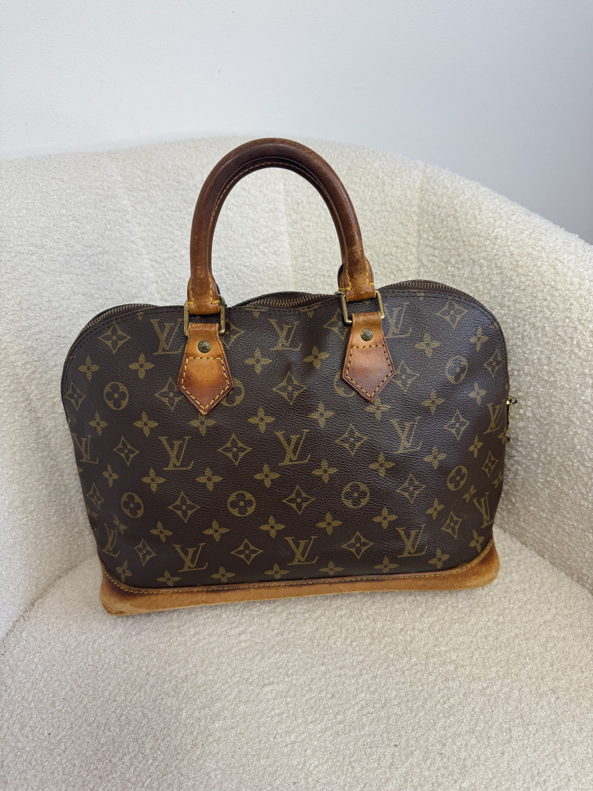 Louis Vuitton Alma Handbag