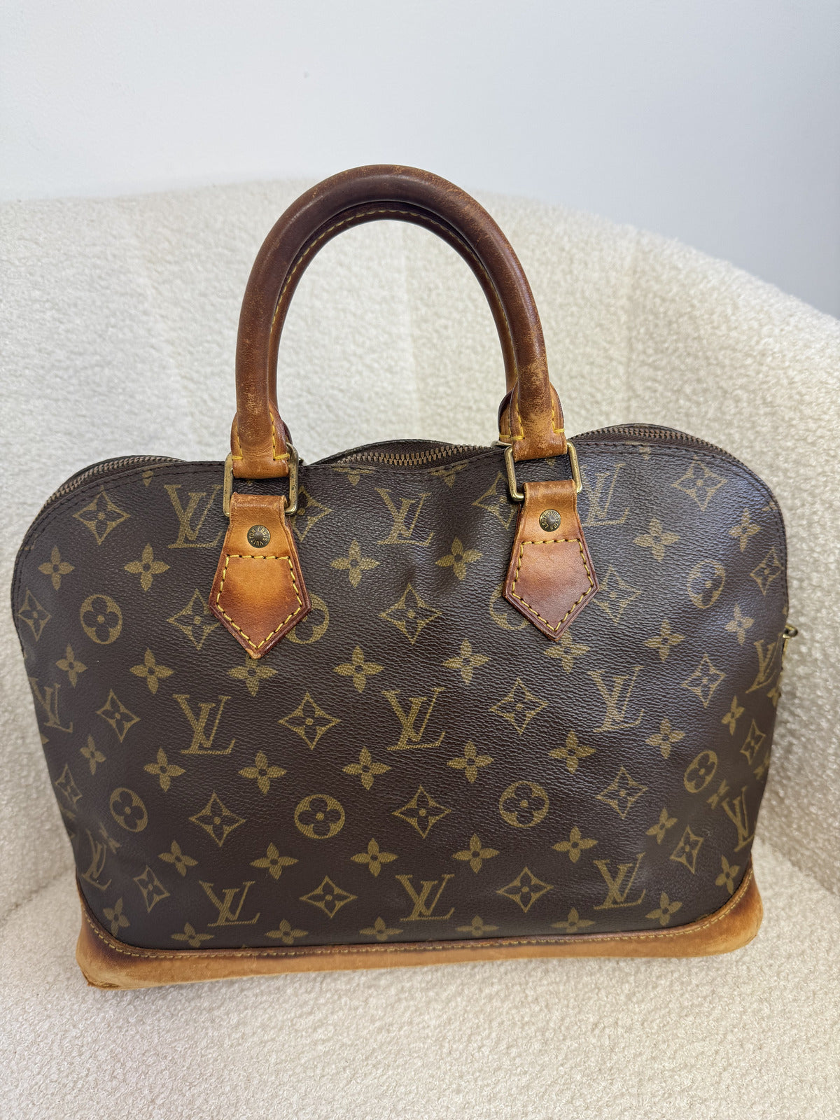 Louis Vuitton Alma Handbag