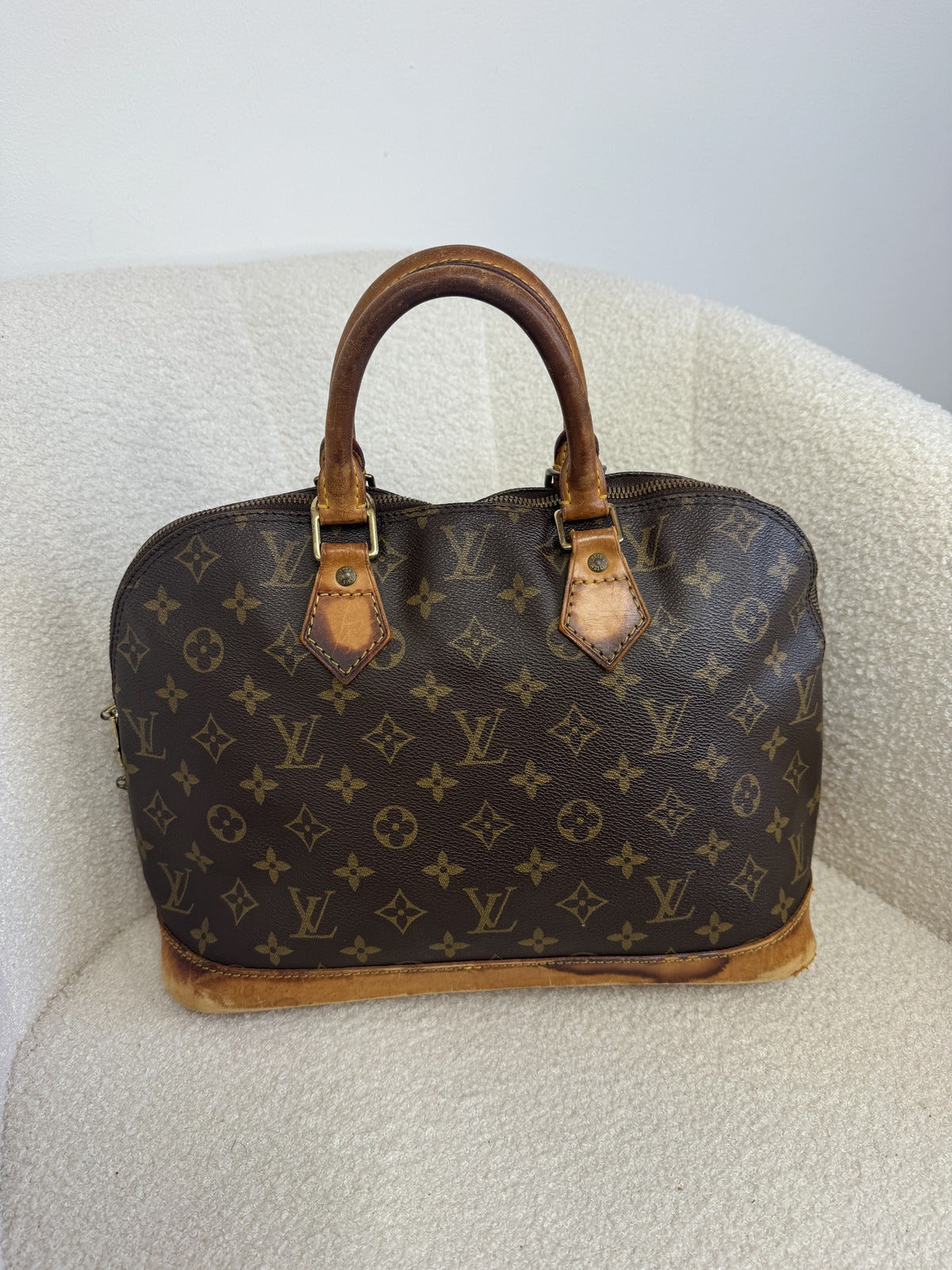 Louis Vuitton Alma Handbag