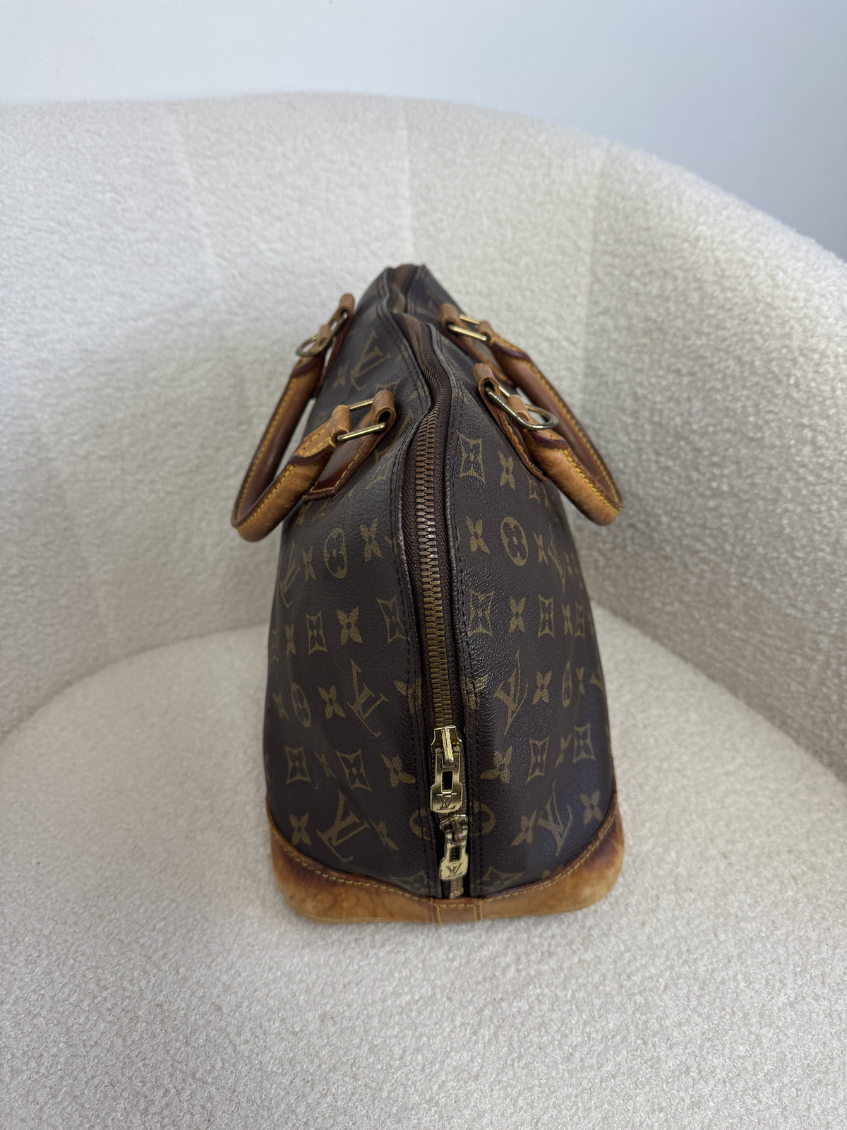 Louis Vuitton Alma Handbag