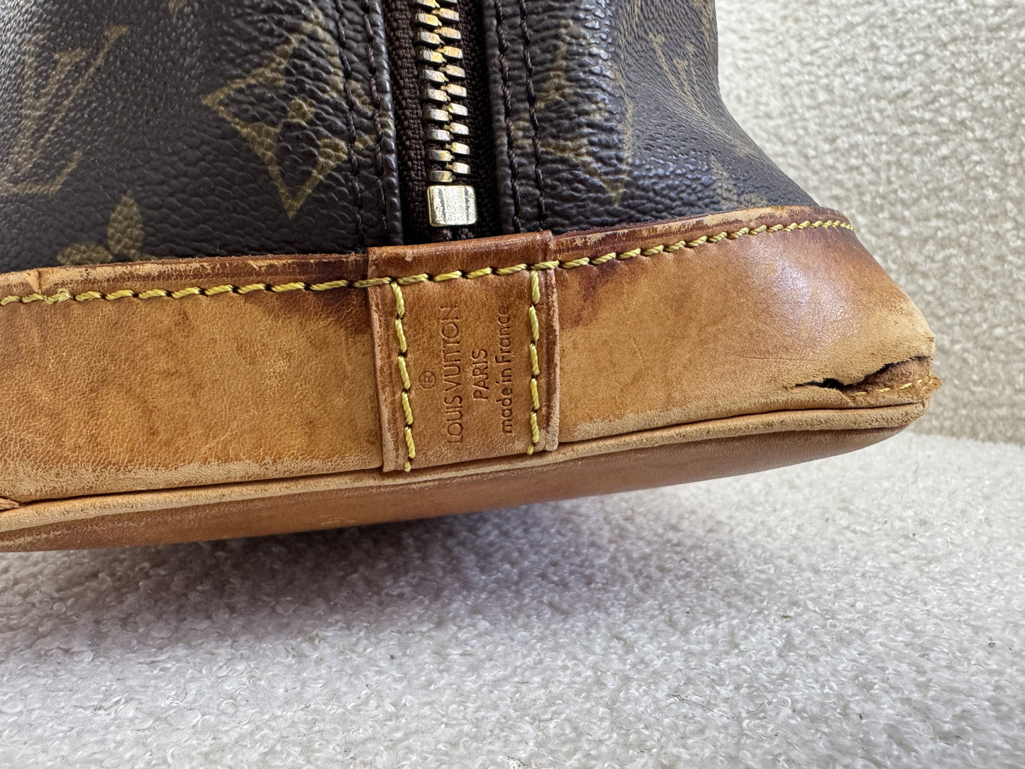 Louis Vuitton Alma Handbag